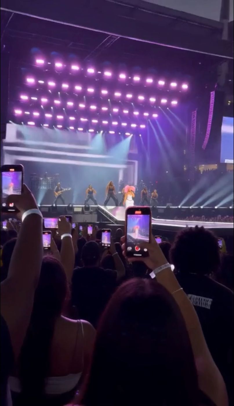 A crowd filming Luxy Heart on stage